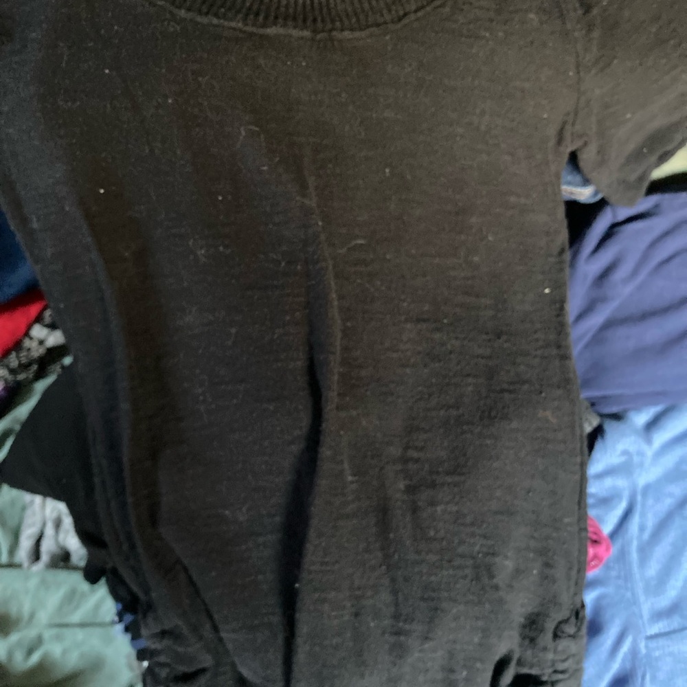 Black So shirt is faded some